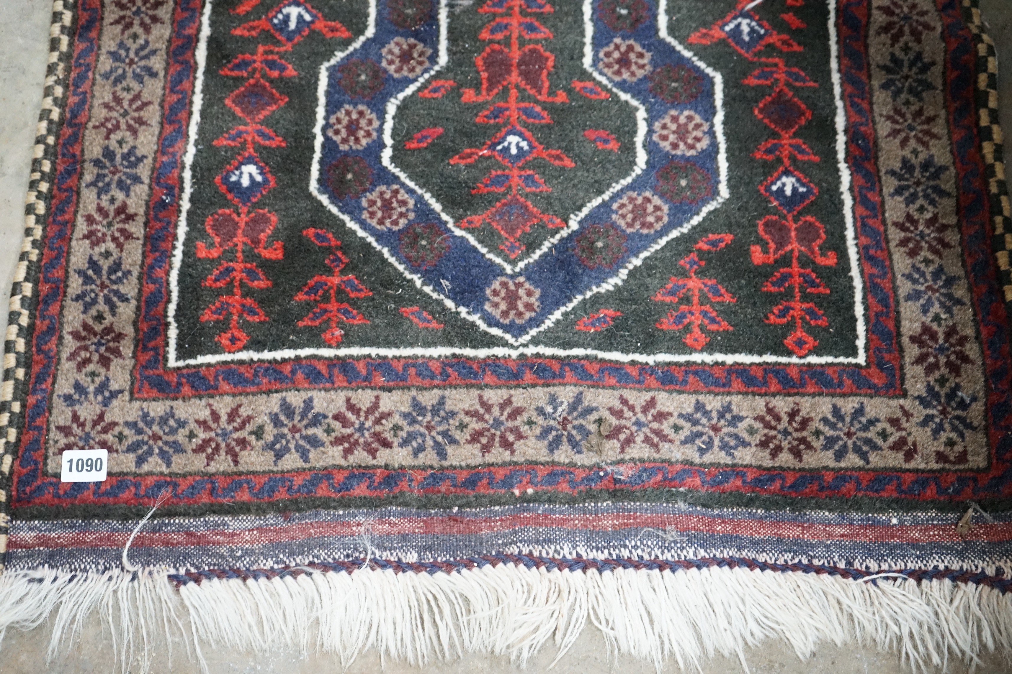 A Belouch blue ground prayer rug, 140 x 74cm